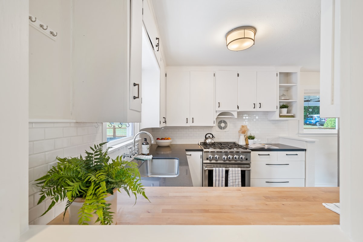 White kitchen with gas range and wall oven, Rocky Mount NC oven repair